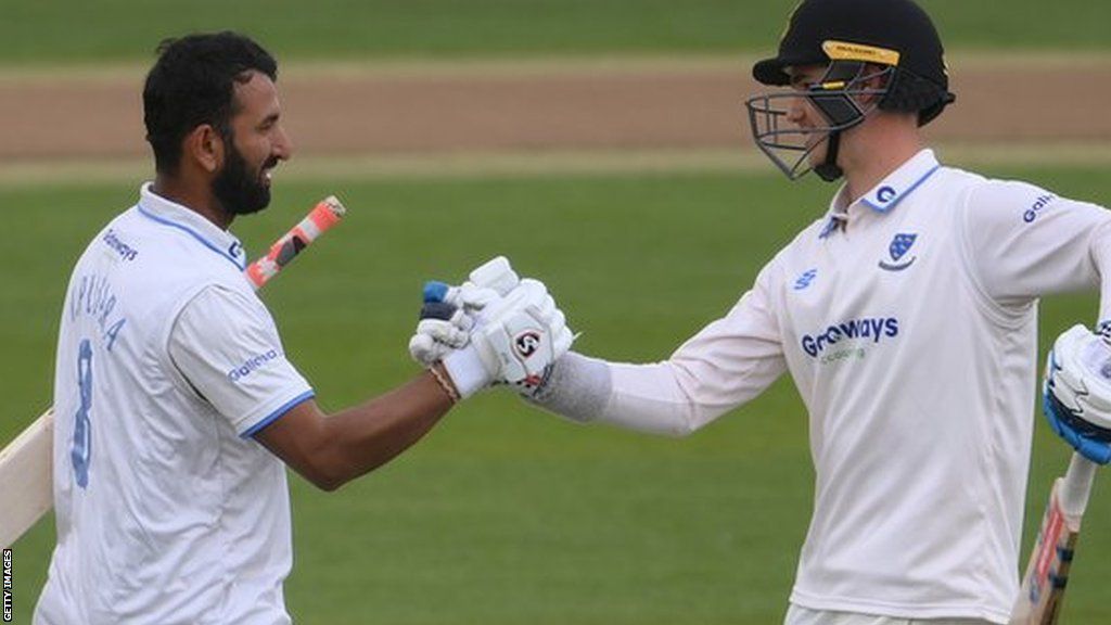 Cheteshwar Pujara and Tom Clark batting for Sussex