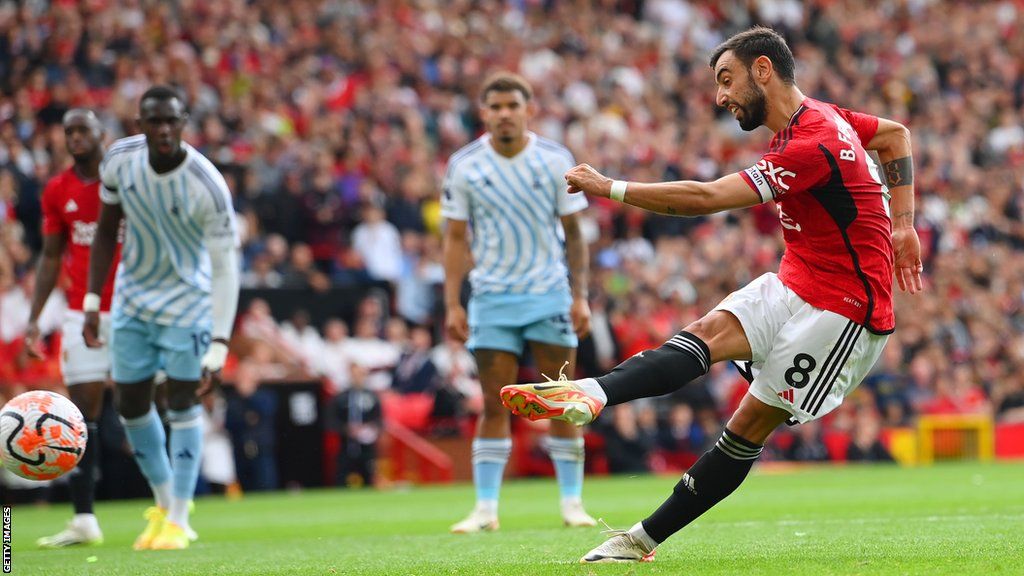 Manchester United's Bruno Fernandes scores from the penalty spot against Nottingham Forest