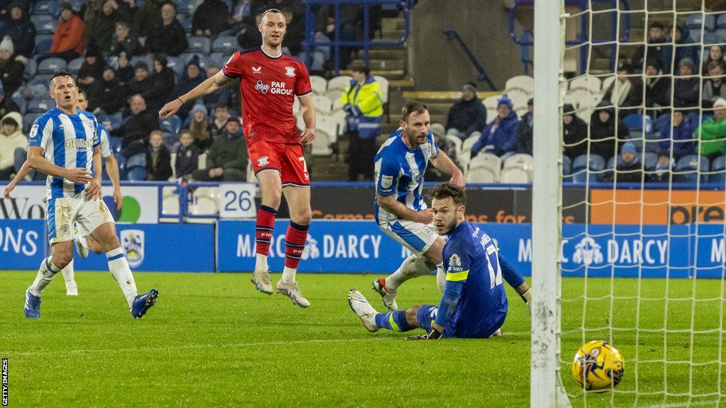 Will Keane scores for Preston North End against Huddersfield