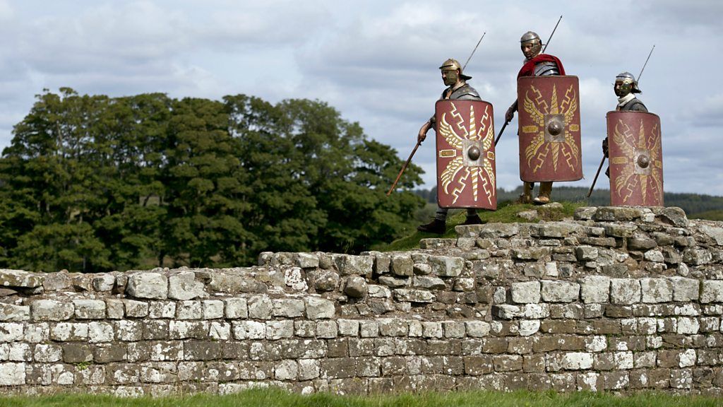 Re-enactors dressed as Roman soldiers on Hadrian's Wall