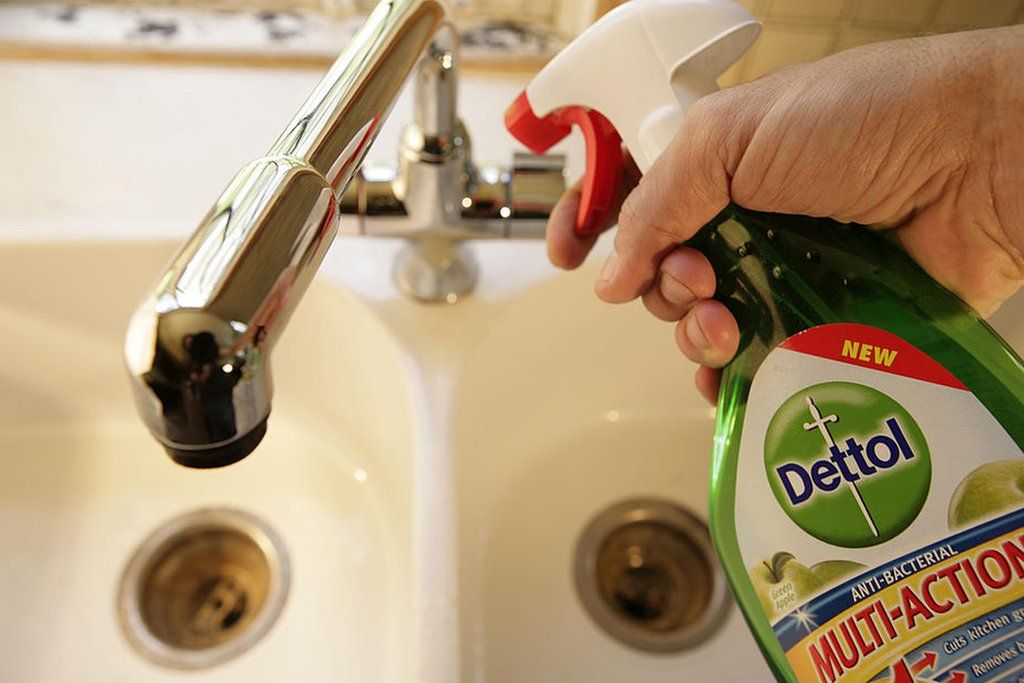Dettol disinfectant sprayed into sink
