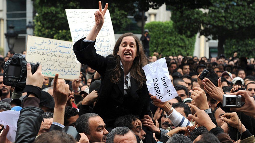 Maya Jeridi, general secretary of the opposition Progressive Democratic party takes part in a protest, Tunis, 14 January 2011