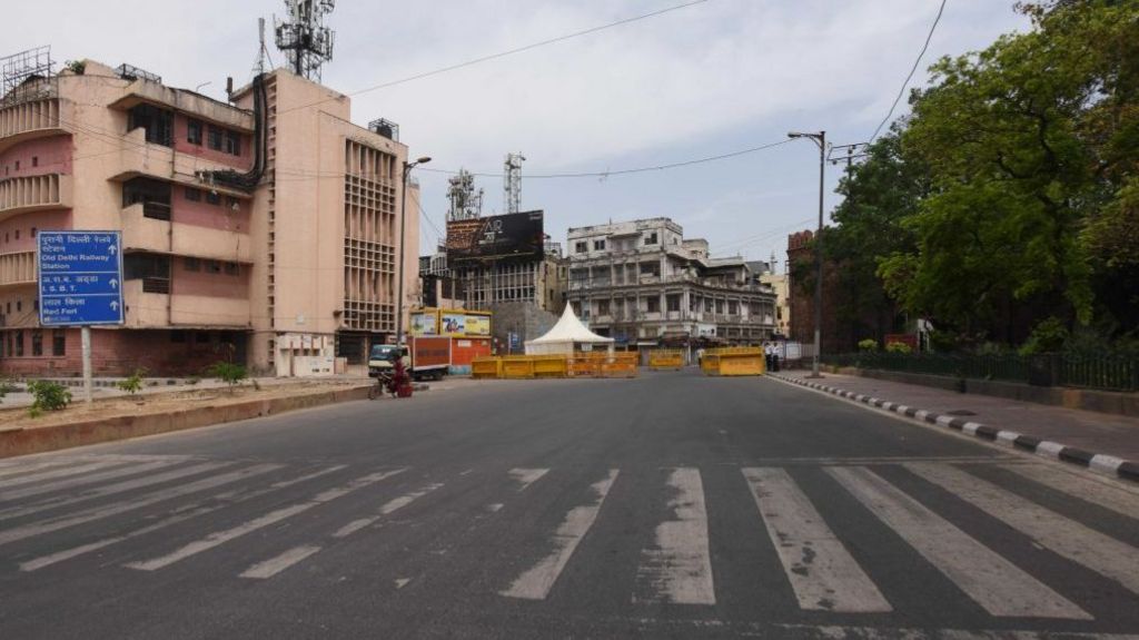 An empty stretch of the road and Delhi Police barricades to screen commuters during lockdown, at Delhi Gate on April 16, 2020 in New Delhi, India.