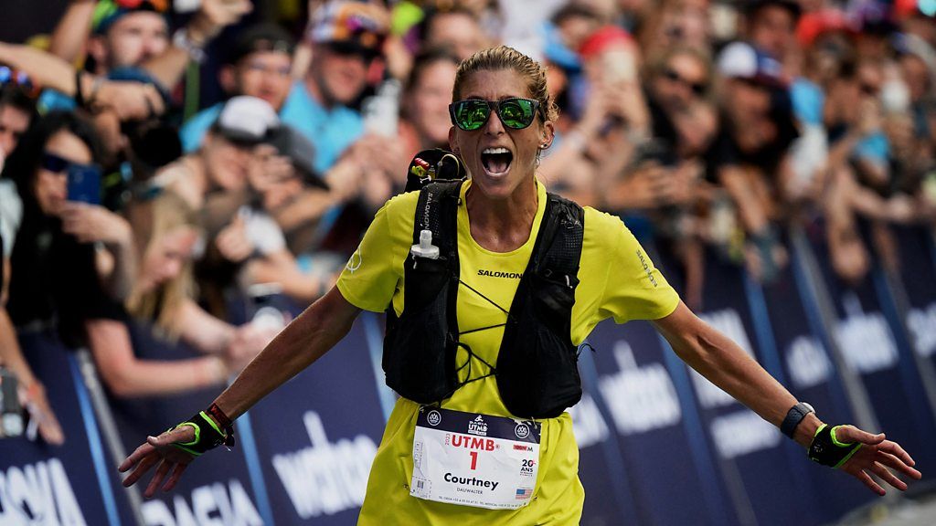 UTMB Courtney Dauwalter crosses the line to win women's race BBC Sport