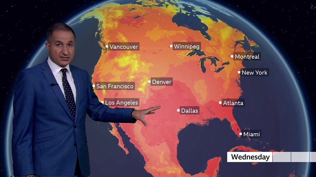 Stav Danaos stands in front of a weather map of the US showing the heat in the southern states