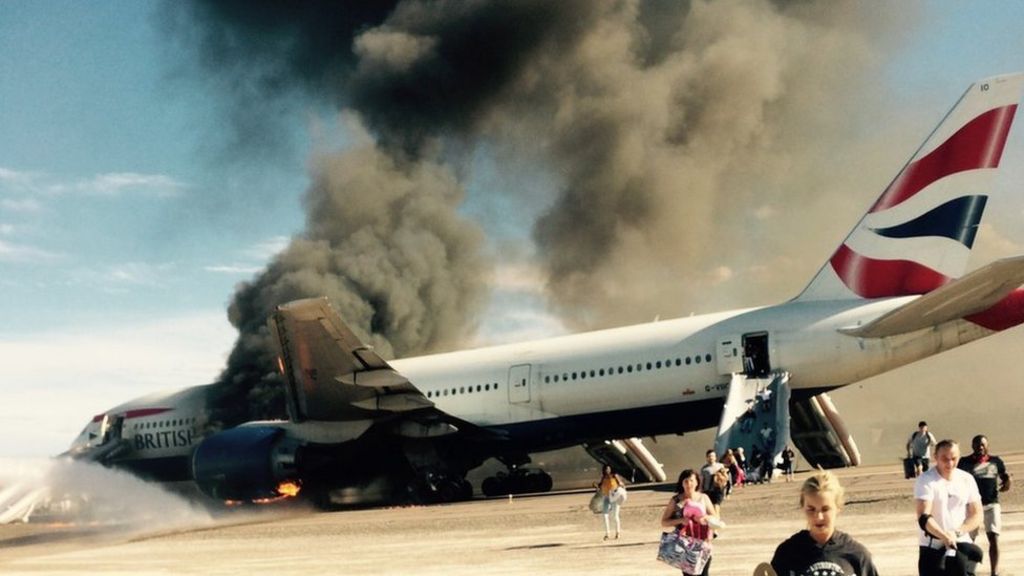 British airways plane catches fire in las vegas bbc news
