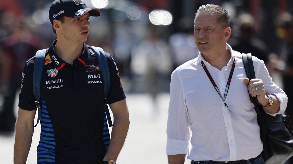 Max and Jos Verstappen walking alongside each other at the 2024 Bahrain Grand Prix