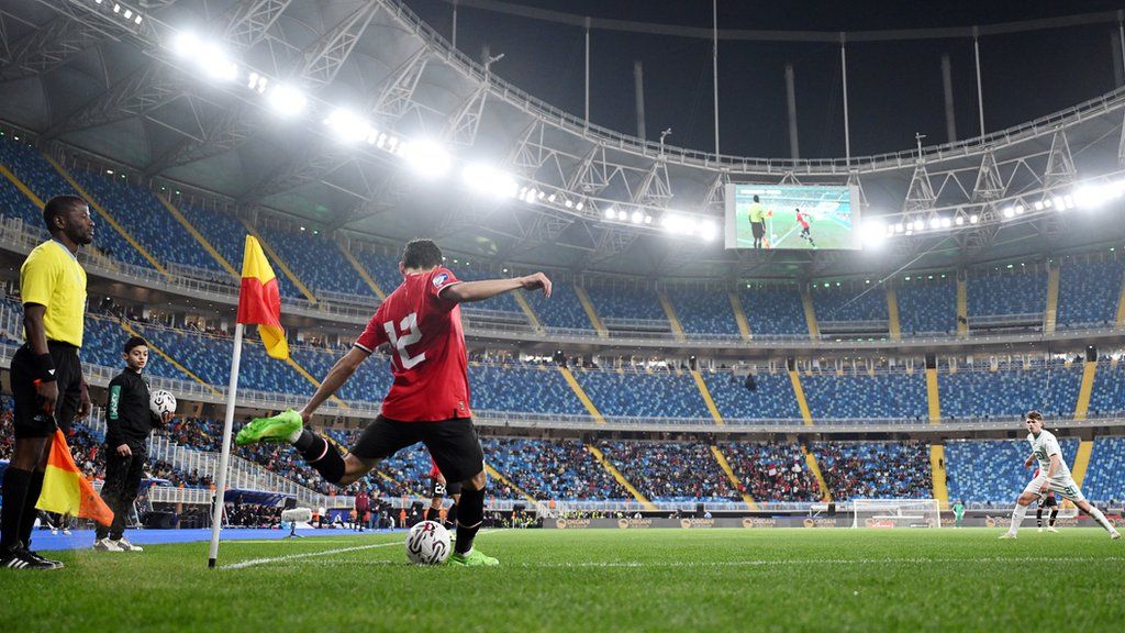 Egypt's Mohamed Hamdy takes a corner at the New Administrative Capital Stadium during a match against New Zealand in March 2024