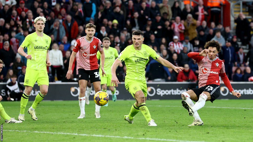Samuel Edozie of Southampton scores his team's fifth goal during the Sky Bet Championship match between Southampton FC and Huddersfield Town at St. Mary's Stadium on February 10, 2024 in Southampton, England.