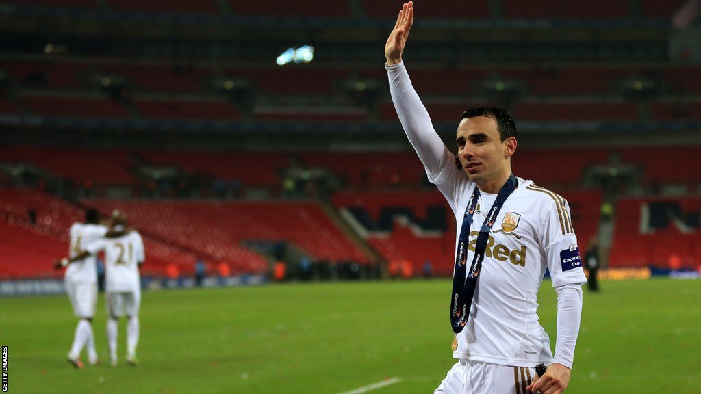 Leon Britton waves to Swansea's fans at Wembley