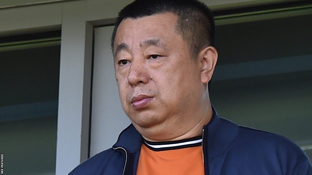 Reading owner Dai Yongge watches a game