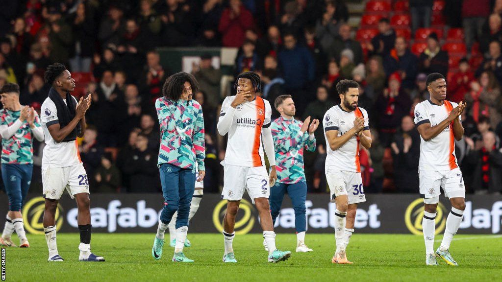Luton players applauding the crowd after the match against Bournemouth was abandoned
