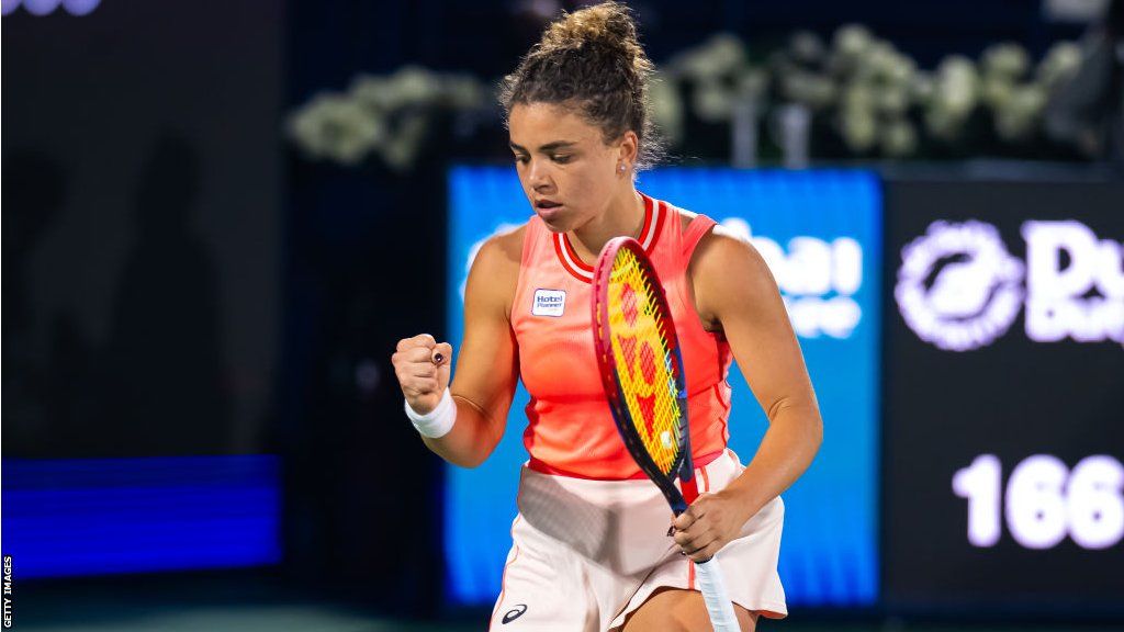 Jasmine Paolini celebrates a point at the Dubai Open