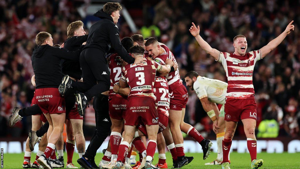 Wigan Warriors players celebrated winning the Super League Grand Final in 2023