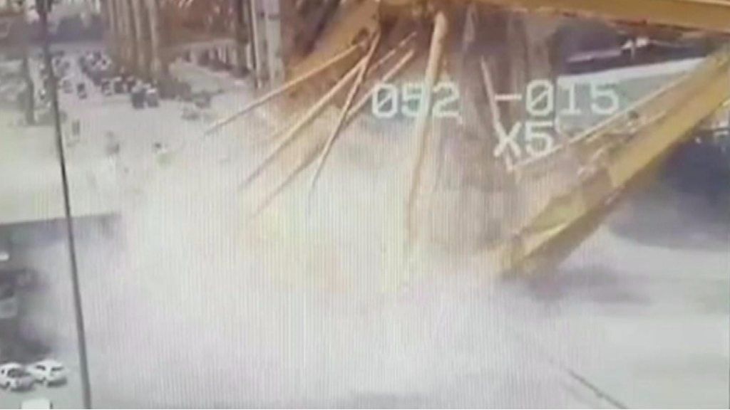 Moment huge Dubai crane collapses