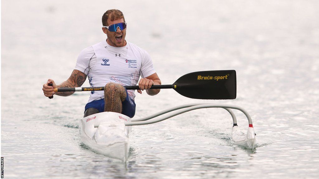 Jack Eyers celebrates victory in the Men's Va'a Single 200m - VL3 Final during the Canoe Sprint competition on day 9 of the European Championships Munich 2022