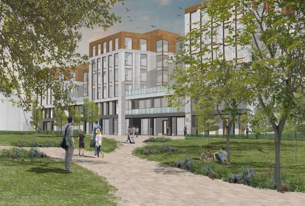 An artists impression of the proposed hotel. Six storeys in height, mostly grey with the top floor brown. Trees and green area in front with people on a path.
