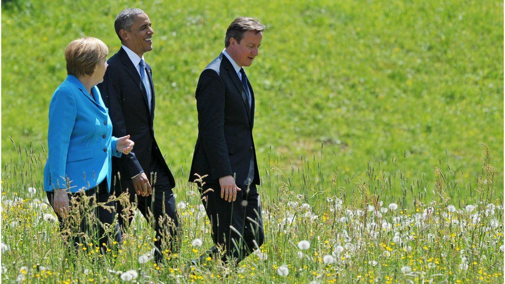 Obama, Merkel and Cameron in a meadow at the G7 in Germany