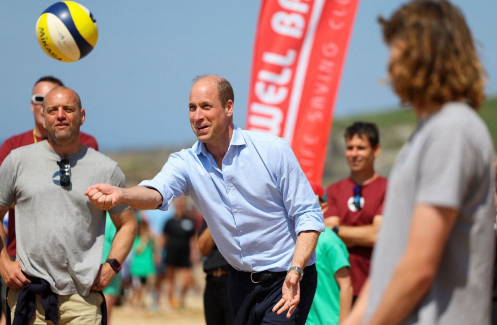 The Prince of Wales, known as the Duke of Cornwall when in Cornwall, plays volleyball during a visit to Fistrall Beach in Newquau