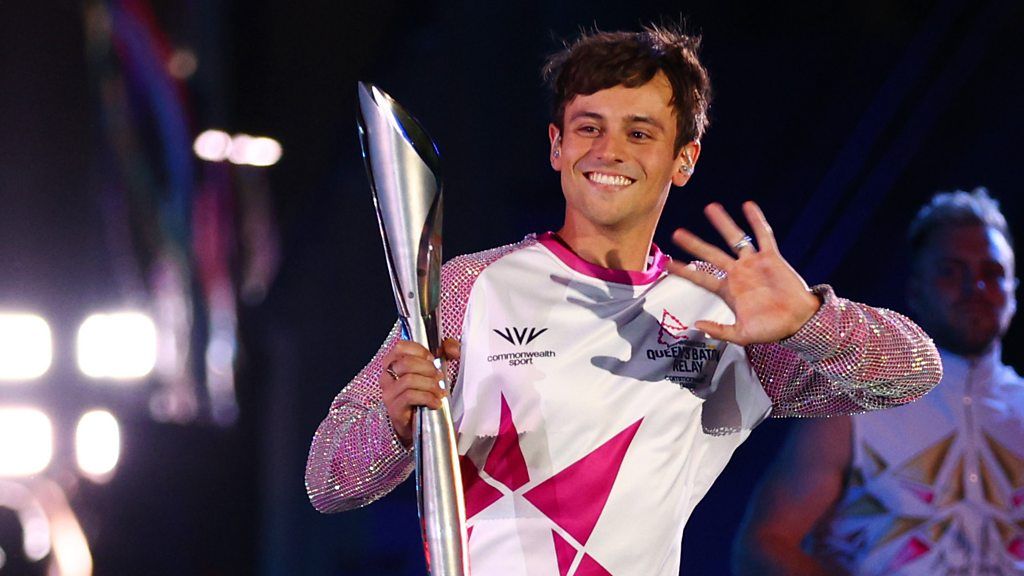 Tom Daley carries baton at ceremony to support LGBT rights