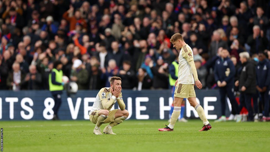 James Maddison holds his head in his hands