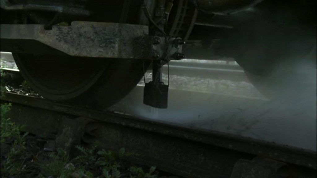 Rail lines being jet-washed