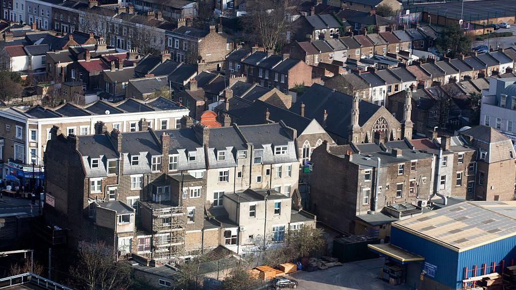 Aerial photo showing rooftops in Newham