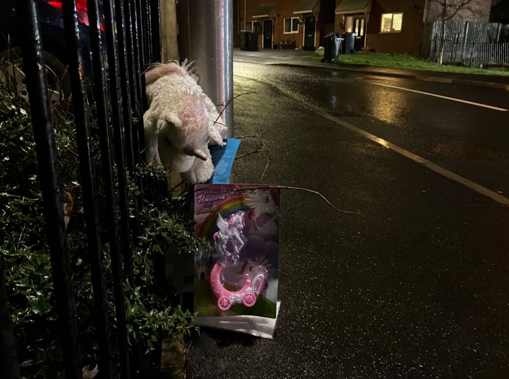 Tributes left at the scene by neighbours
