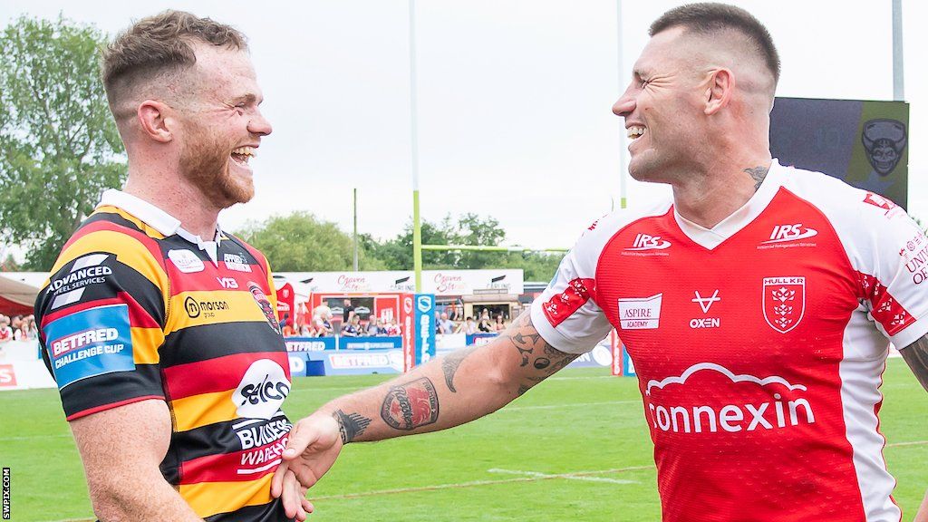 Joe Burgess shares a joke with Shaun Kenny-Dowall