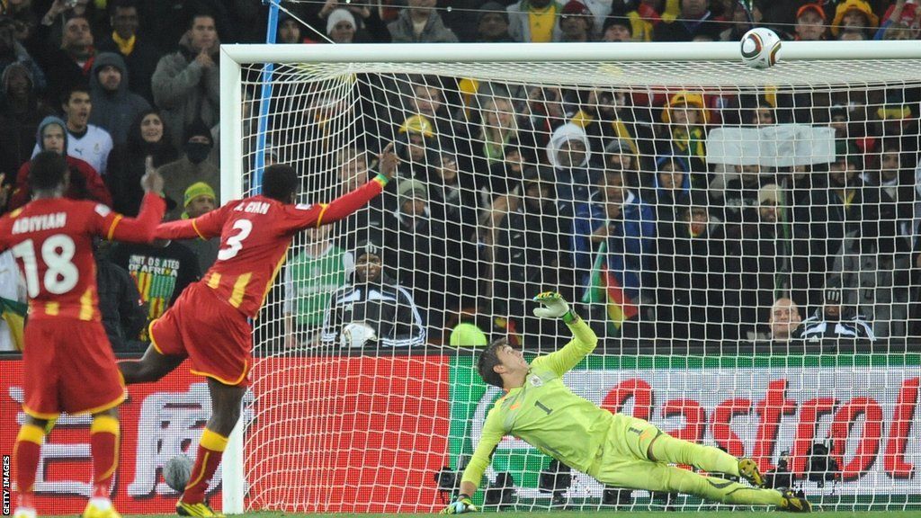 Asamoah Gyan strikes his penalty against Uruguay onto the bar