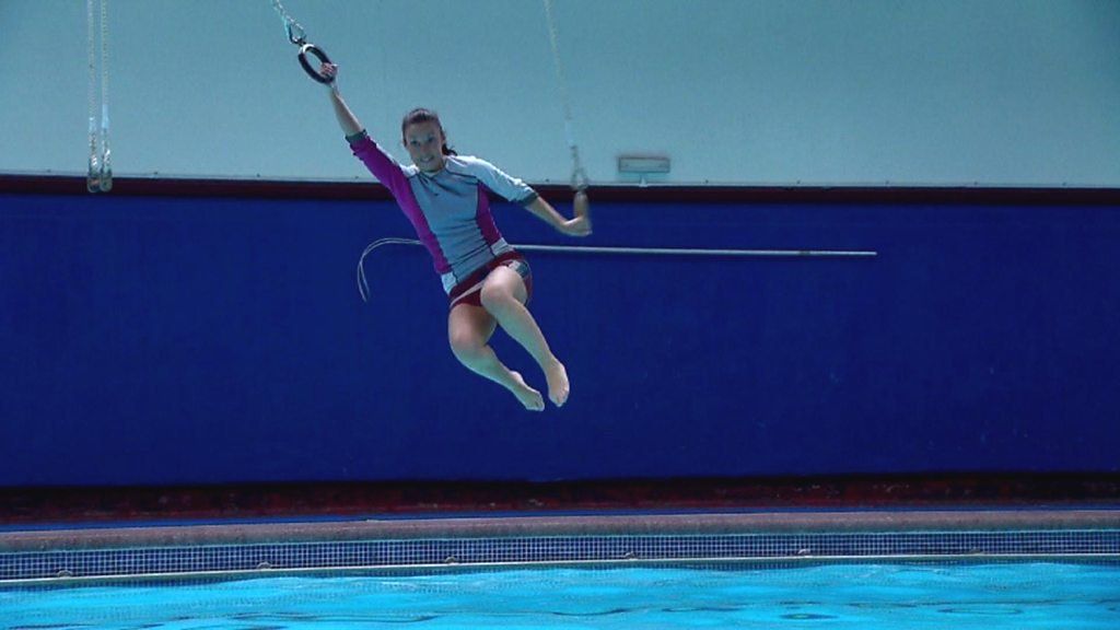 Lifeguard's swimming-pool rings workout