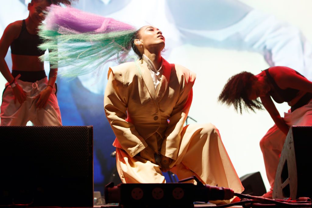 Rina Sawayama performs on stage