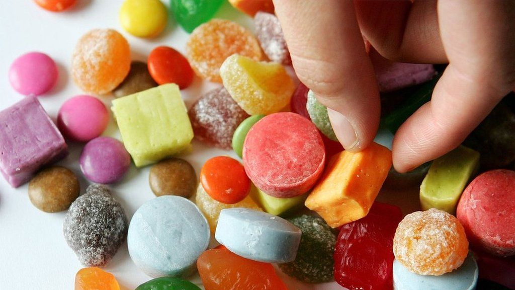 Image of lots of different types of coloured sweets