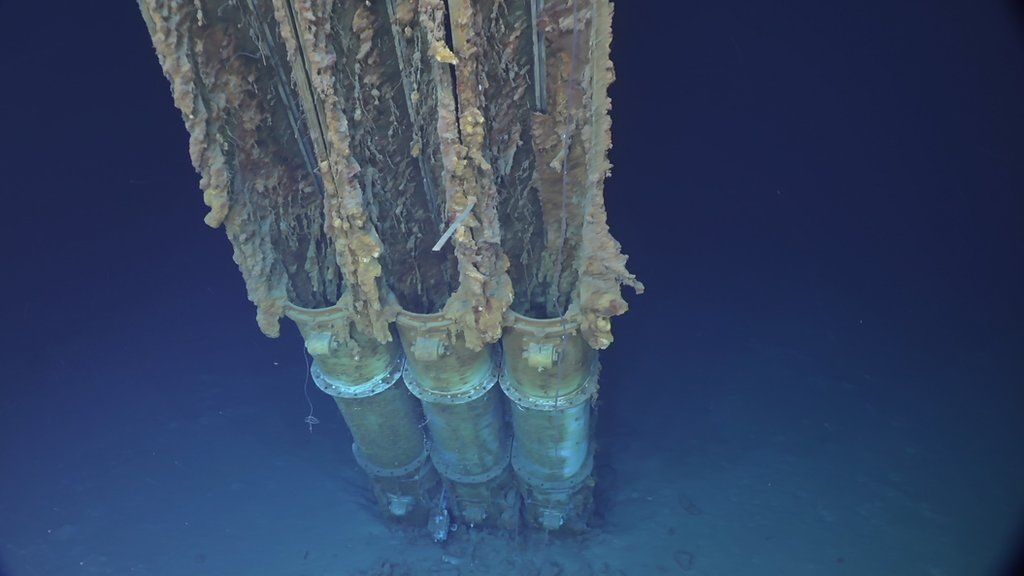 underwater shot of torpedo tubes