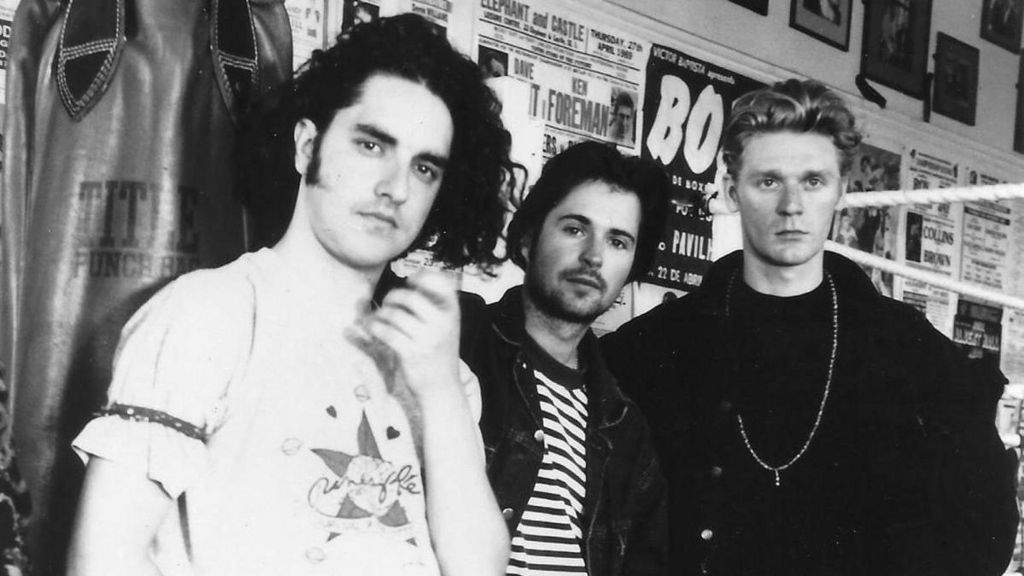 Ian Prowse stands alongside two other members of the band Pele, in a photo taken in the early 1990s in a boxing gym.