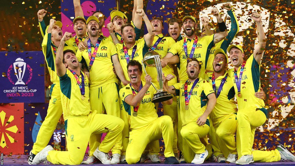 Australia celebrate with the World Cup trophy