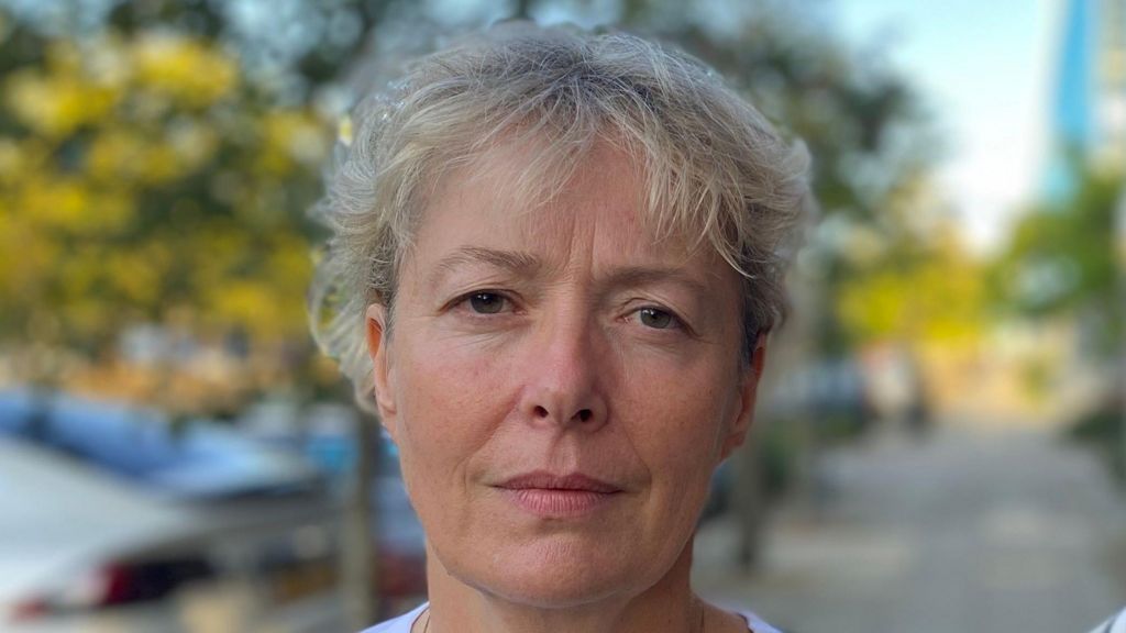 Jane Steel, a woman with short grey-blonde hair