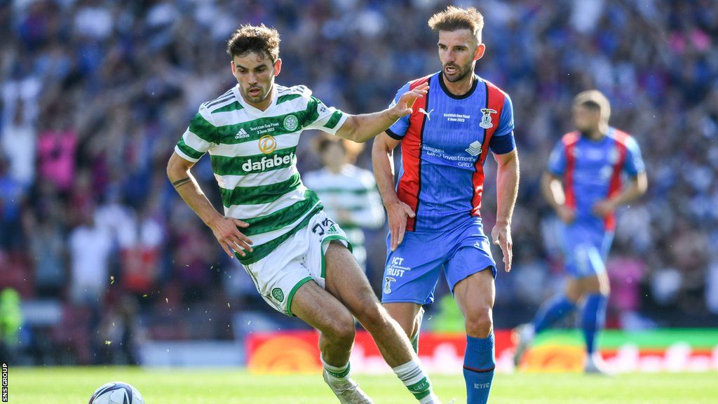 Celtic's Matt O'Riley (L) and Inverness' Sean Welsh during a Scottish Cup final match between Celtic and Inverness Caledonian Thistle at Hampden Park