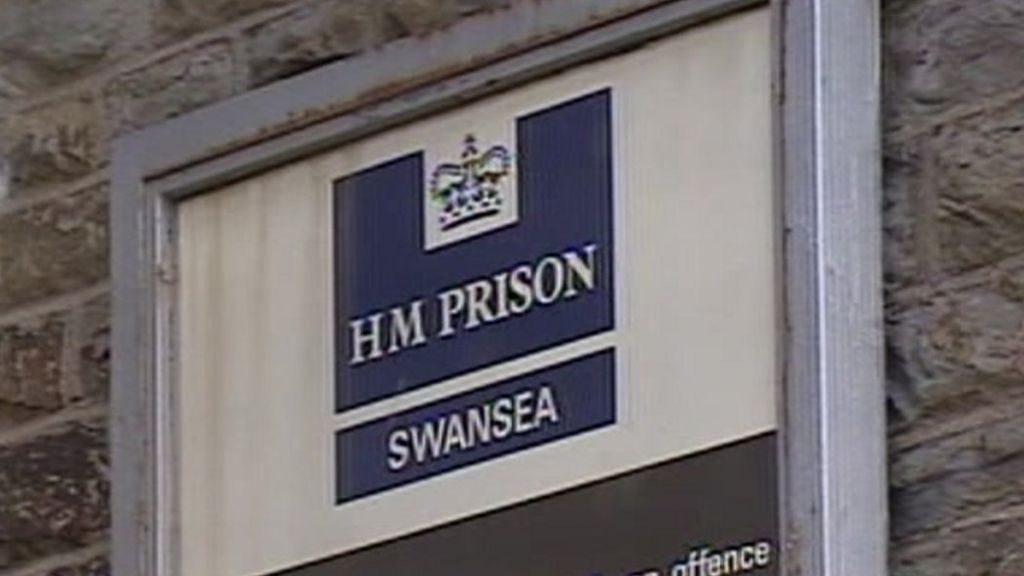 HMP Swansea sign at the prison