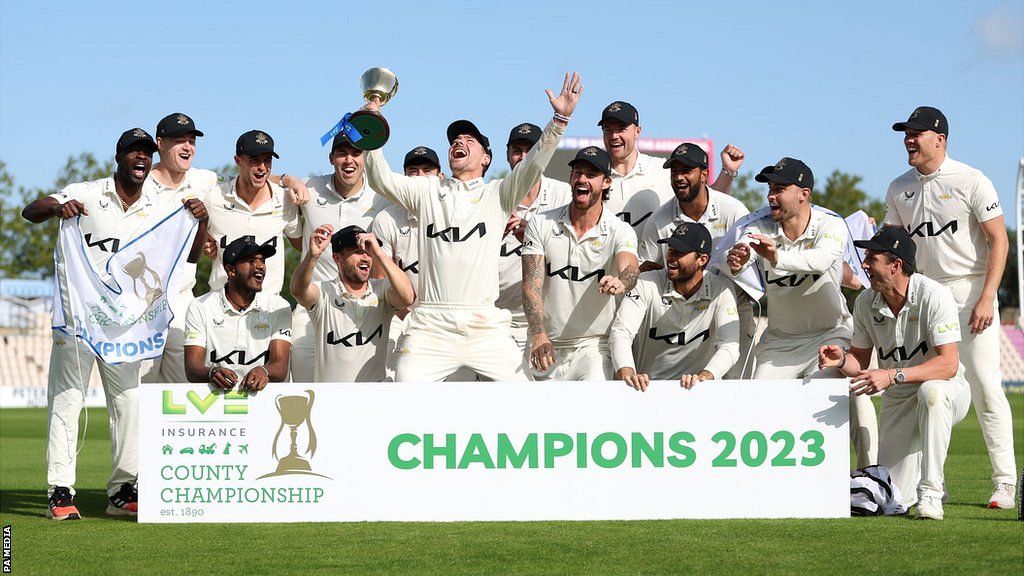 Surrey with the County Championship cup