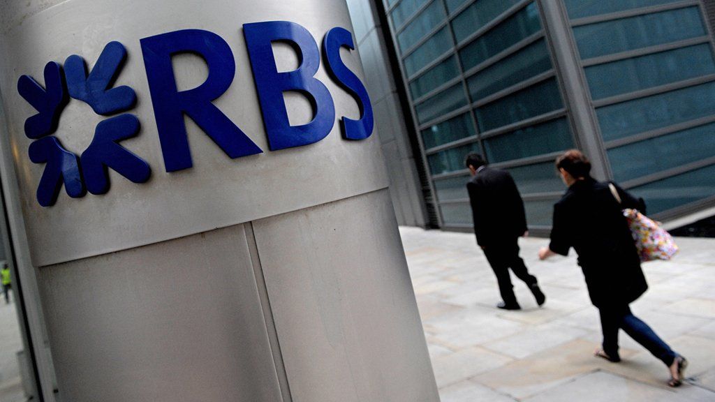 People walk past the London headquarters of the Royal Bank of Scotland