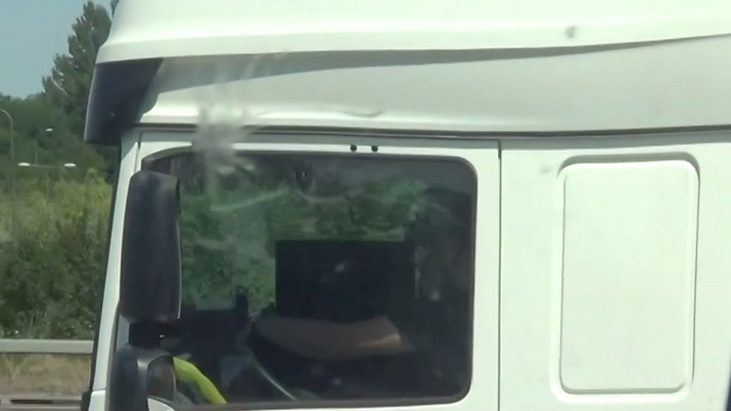 Lorry driver using laptop