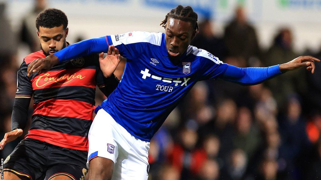 Freddie Ladapo holds off QPR's Jake Clarke-Salter