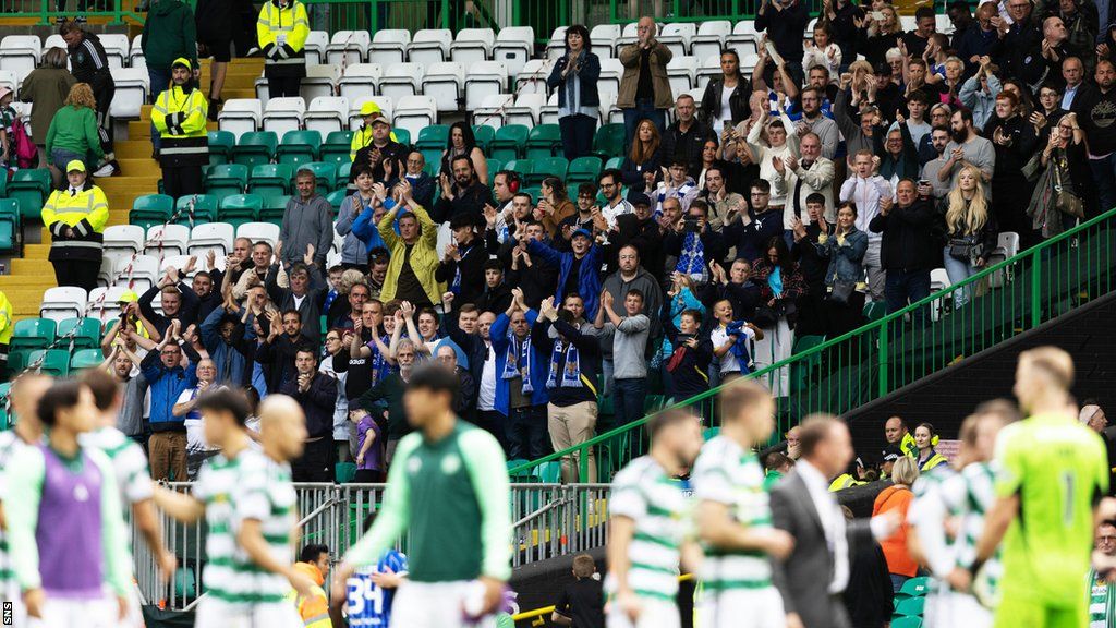 St Johnstone supporters applauding after their side's 0-0 draw at Celtic Park