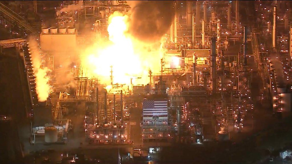Crews battled to put out the fire at the Marathon Refinery near Los Angeles which could be seen for miles.
