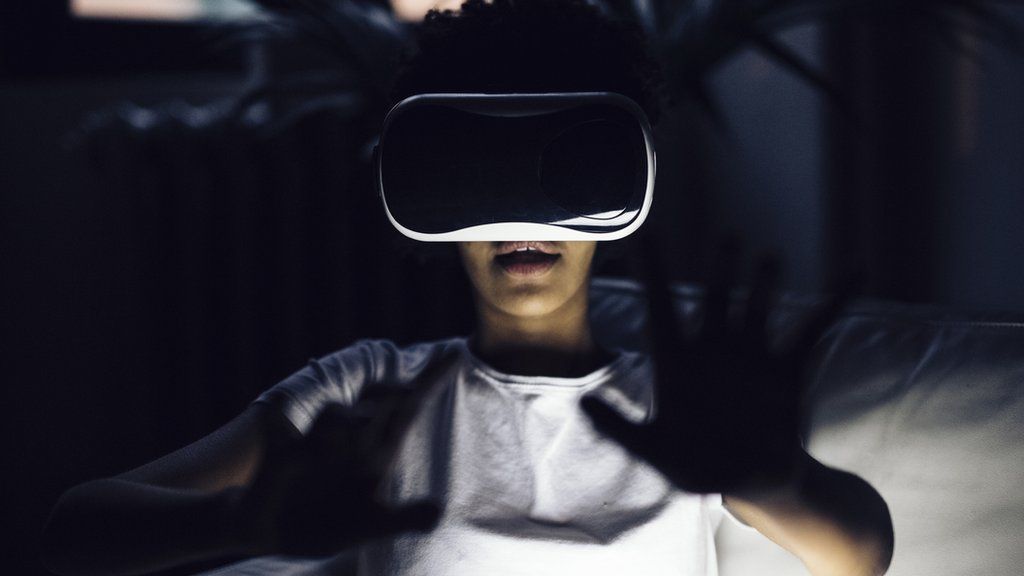 A stock image of a woman using VR