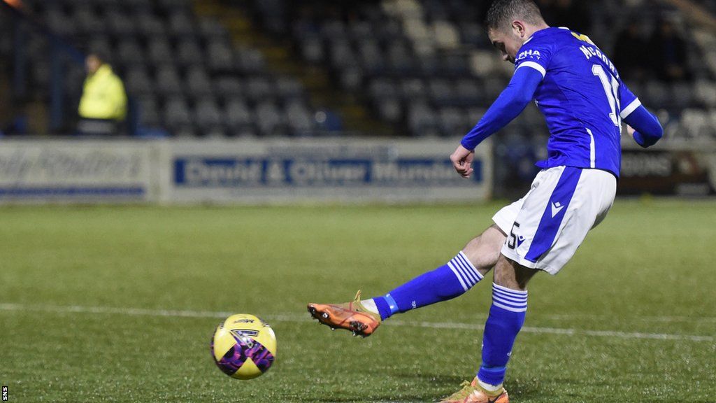 Queen of the South's Calvin McGrory scores the winning penalty