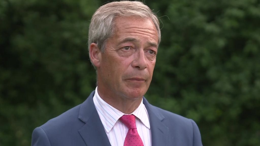 Nigel Farage being asked about offensive comments made by his campaigners