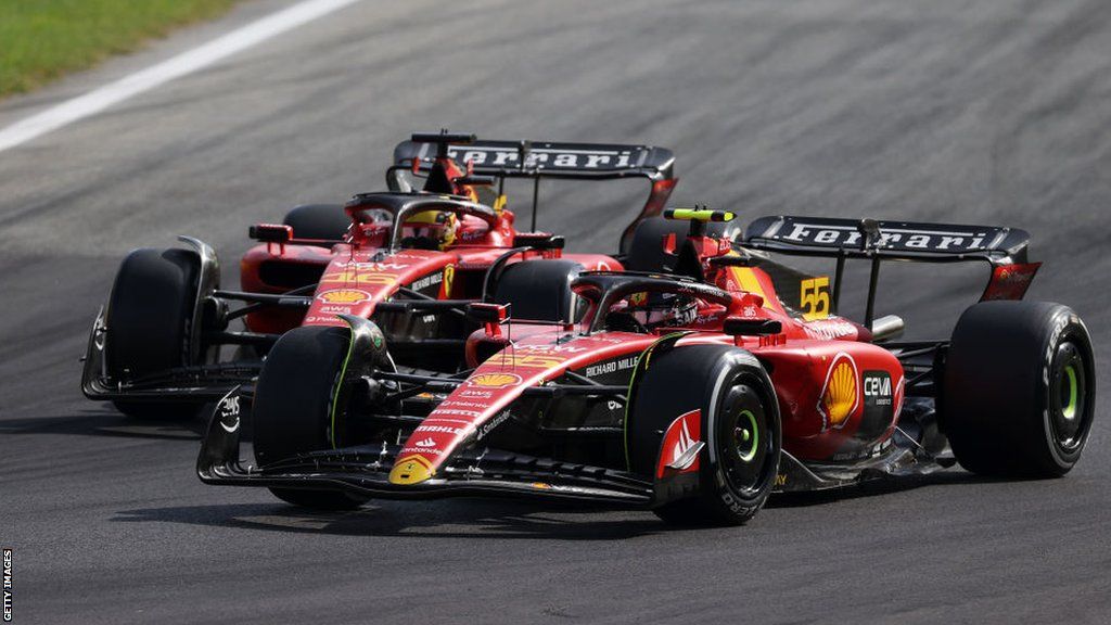 The Ferraris of Carlos Sainz and Charles Leclerc battle for position