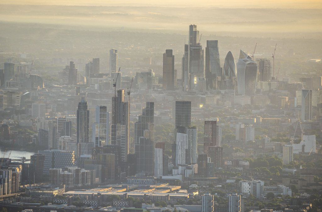 Misty morning view over Vauxhall with the City of London in background